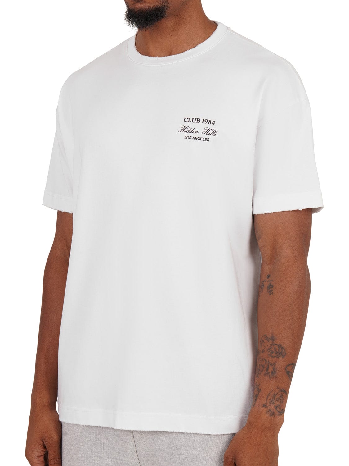 CLUB 1984. Hidden Hills Distressed T-Shirt - White T-Shirt