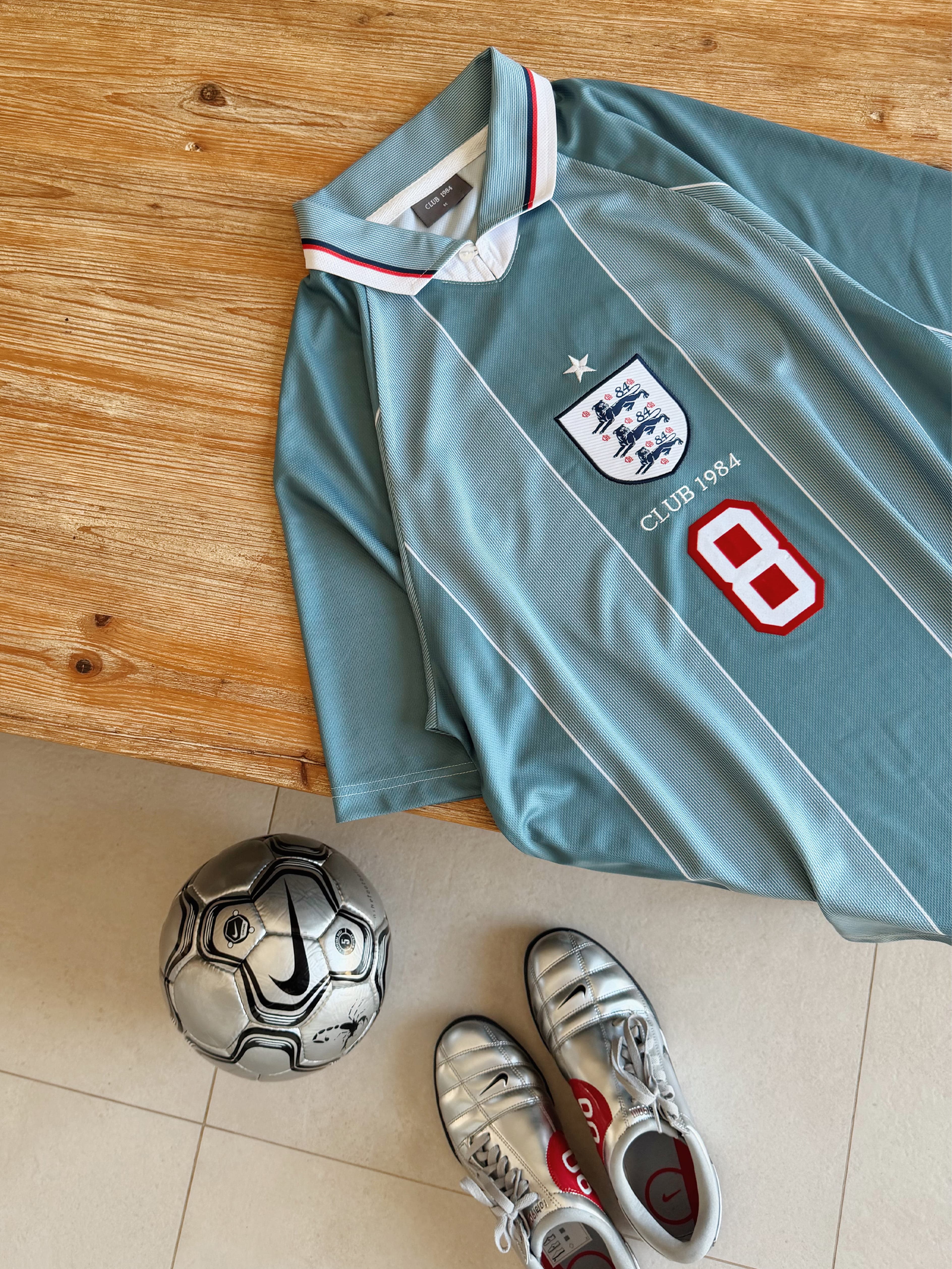 CLUB 1984. 1984 Football Jersey - Blue T-Shirt