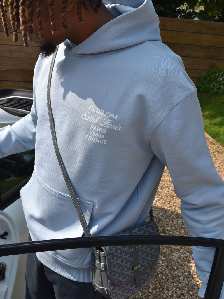 CLUB 1984. Patron 84 Hoodie - Light Blue Hoodie