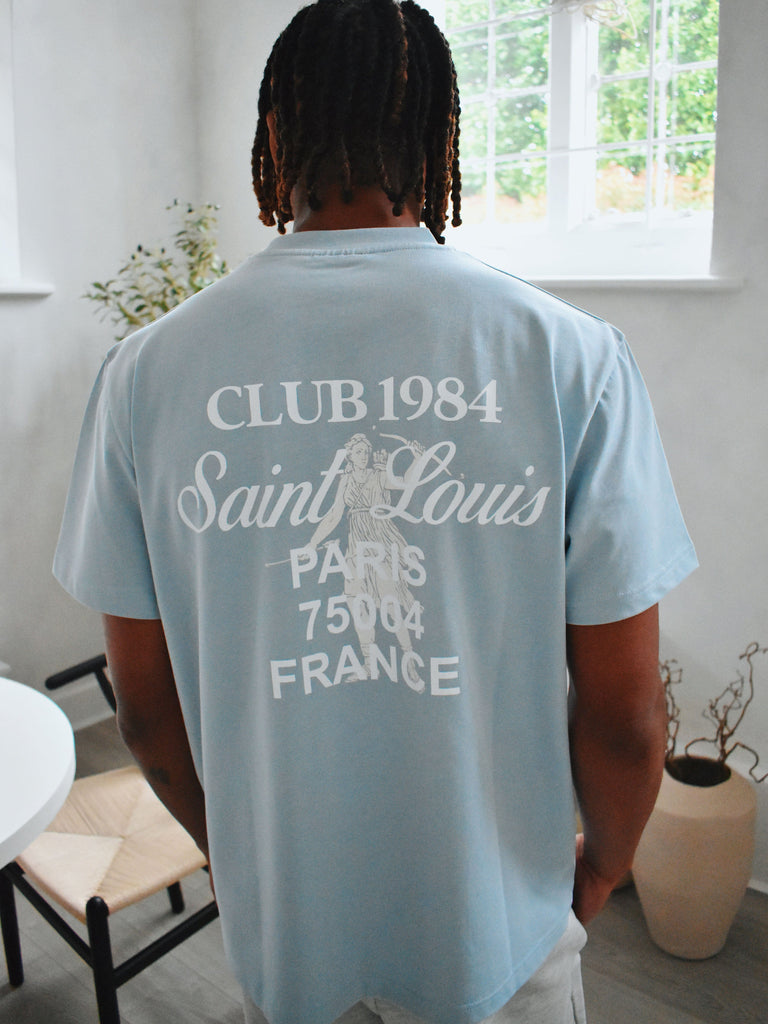 CLUB 1984. Patron 84 T-shirt - Light Blue T-Shirt